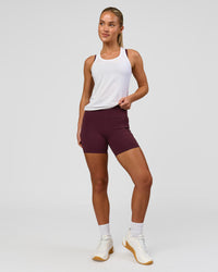 Woman wearing AeroFLX+ Seamless Tank - White/White | Model:Issy | Size:XS | Thumbnail Index: 4