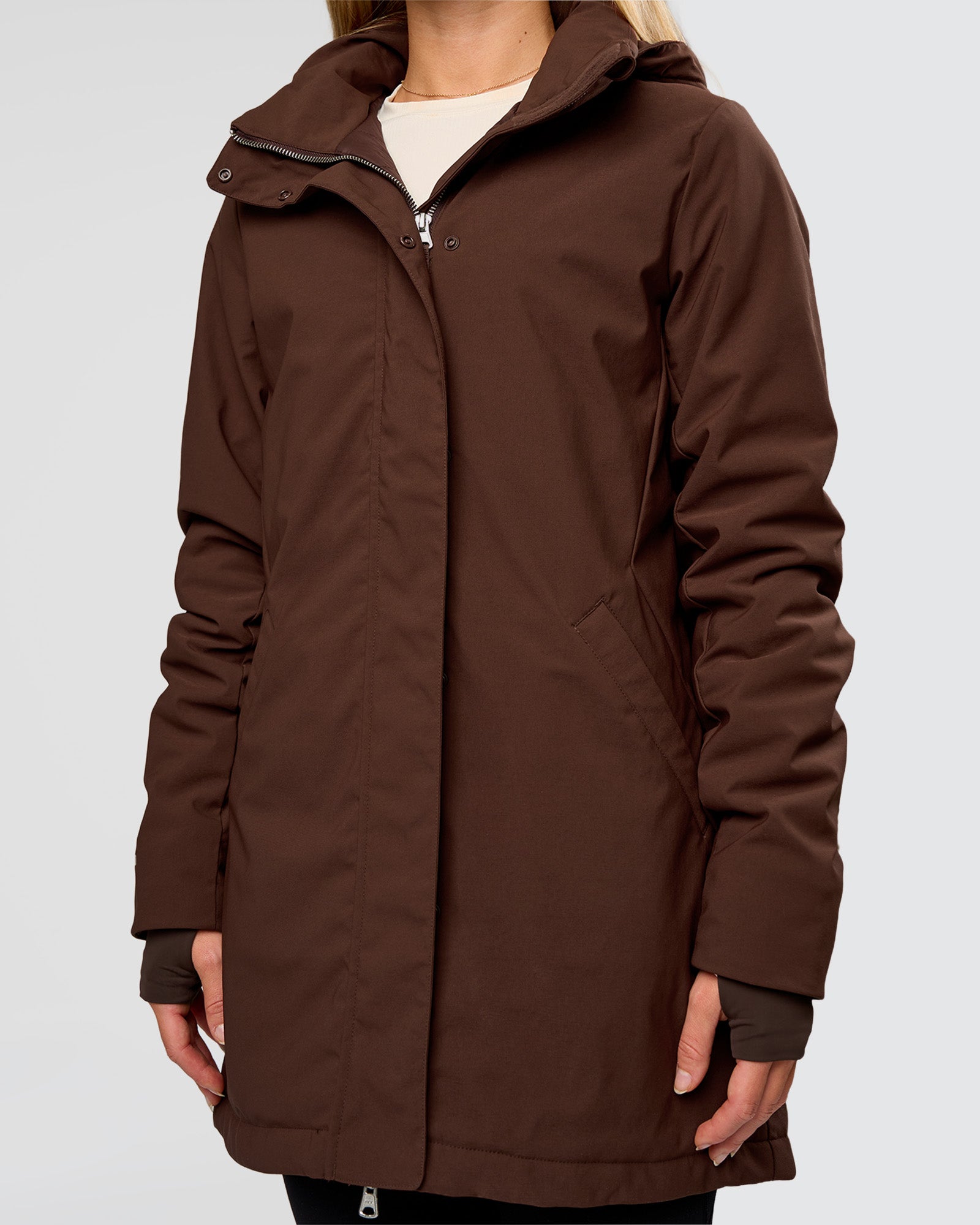 Woman wearing Auxiliary 2.0 Longline Jacket - Hot Chocolate | Model:Issy | Size:XS