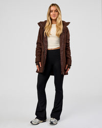 Woman wearing Auxiliary 2.0 Longline Jacket - Hot Chocolate | Model:Issy | Size:XS | Thumbnail Index: 5