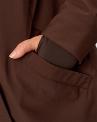 Woman wearing Auxiliary 2.0 Longline Jacket - Hot Chocolate | Model:Issy | Size:XS | Thumbnail Index: 8