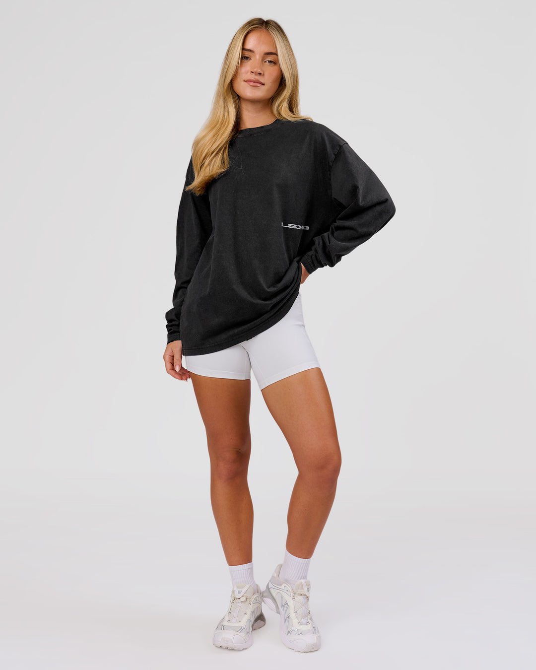 Woman wearing Backline Washed Heavyweight Oversized LS Tee - Black Washed | Model:Issy | Size:XS - view 10