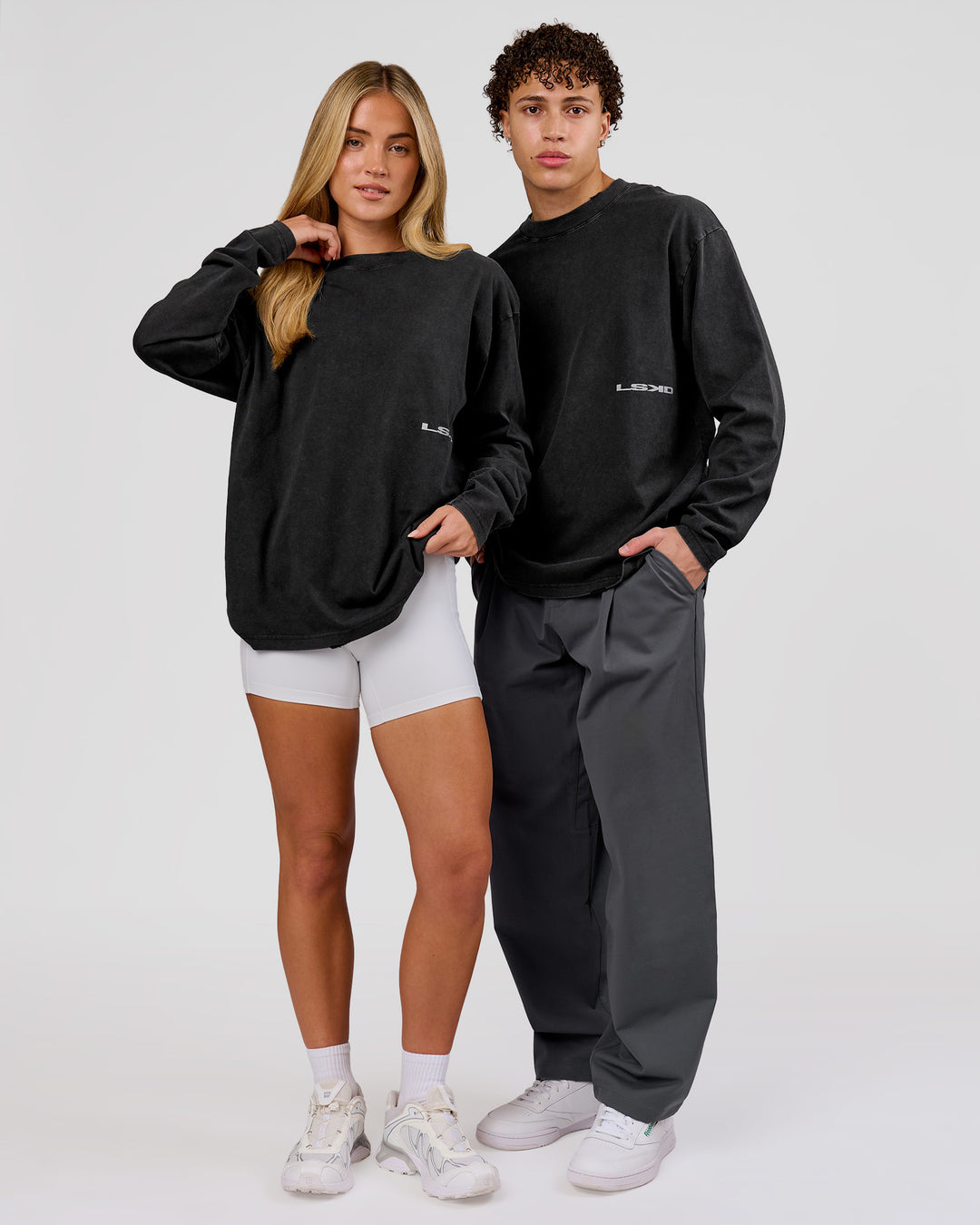 Woman wearing Backline Washed Heavyweight Oversized LS Tee - Black Washed | Model:Issy | Size:XS - view 16