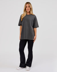 Woman wearing Backline Washed Heavyweight Oversized Tee - Asphalt Washed | Model:Issy | Size:XS | Thumbnail Index: 11