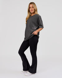 Woman wearing Backline Washed Heavyweight Oversized Tee - Asphalt Washed | Model:Issy | Size:XS | Thumbnail Index: 14