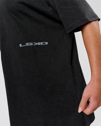 Woman wearing Backline Washed Heavyweight Oversized Tee - Black Washed | Model:Issy | Size:XS | Thumbnail Index: 14
