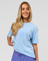 Woman wearing Benchmark FLXCotton Oversized Tee - Open Air-Blue Bell | Model:Issy | Size:XS | Thumbnail Index: 5