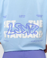 Woman wearing Benchmark FLXCotton Oversized Tee - Open Air-Blue Bell | Model:Issy | Size:XS | Thumbnail Index: 2