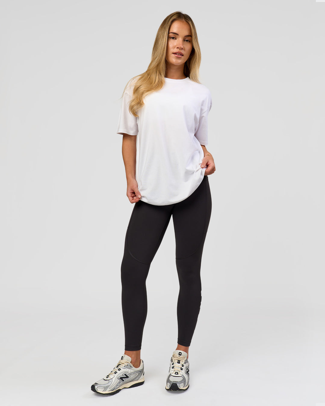 Woman wearing Benchmark FLXCotton Oversized Tee - White-Pale Lilac | Model:Issy | Size:XS - view 16