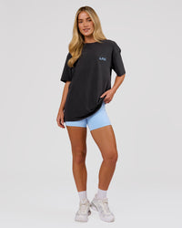 Woman wearing Blended FLXCotton Oversize Tee  - Black Washed | Model:Issy | Size:XS | Thumbnail Index: 12