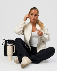 Woman wearing Bomber ZeroCrease Spacer Jacket - Silver Marl | Model:Issy | Size:XS | Thumbnail Index: 5