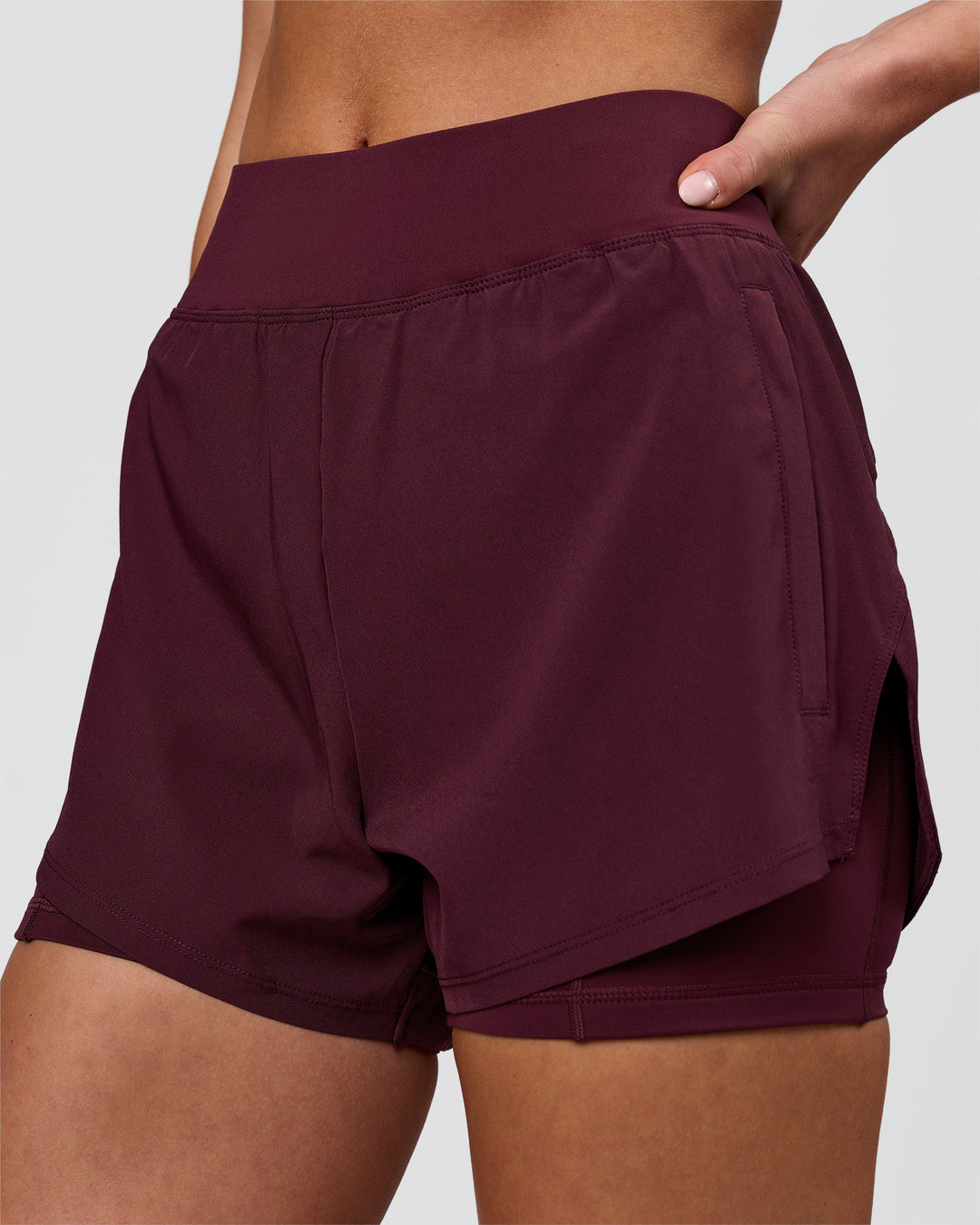 Woman wearing Challenger 3" Lined Performance Short - Cherry Lacquer | Model:Issy | Size:XS - view 1