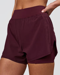 Woman wearing Challenger 3" Lined Performance Short - Cherry Lacquer | Model:Issy | Size:XS | Thumbnail Index: 0