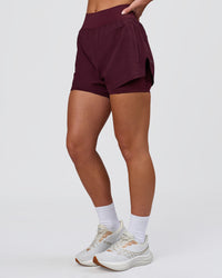 Woman wearing Challenger 3" Lined Performance Short - Cherry Lacquer | Model:Issy | Size:XS | Thumbnail Index: 4