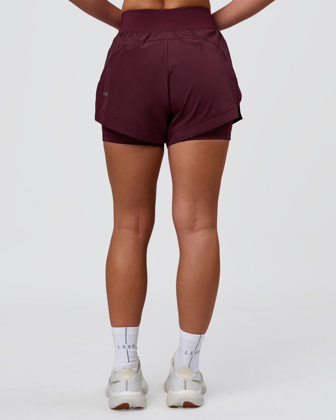 Woman wearing Challenger 3" Lined Performance Short - Cherry Lacquer | Model:Issy | Size:XS - view 11