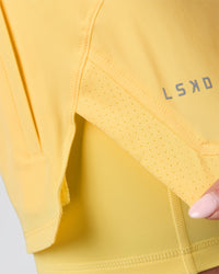 Woman wearing Challenger 3" Lined Performance Short - Lemon | Model:Issy | Size:XS | Thumbnail Index: 9