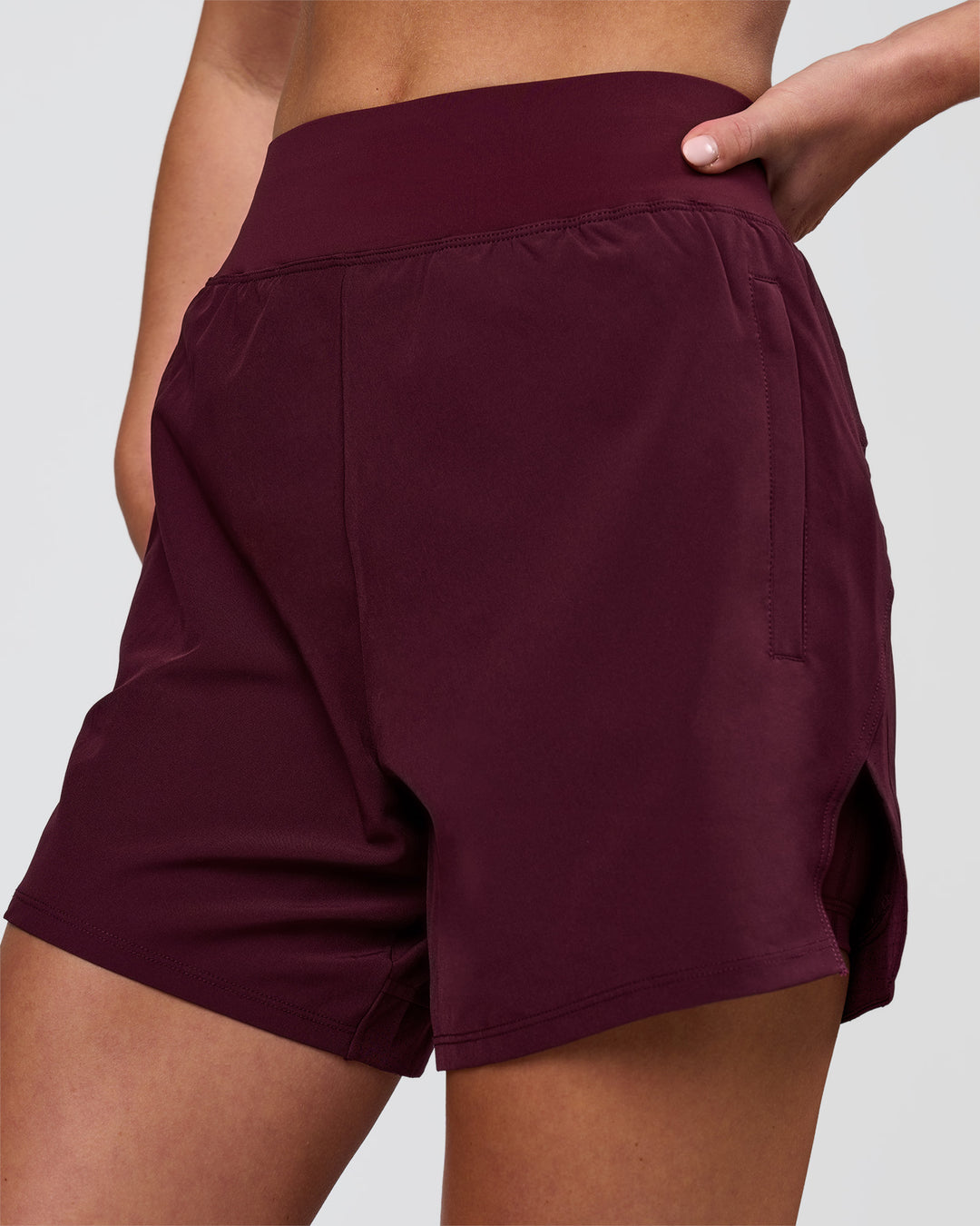 Woman wearing Challenger 5" Lined Performance Short - Cherry Lacquer | Model:Issy | Size:XS - view 1