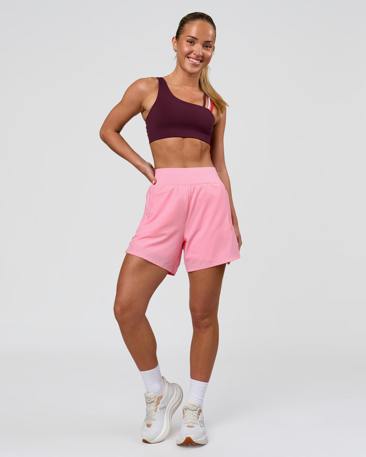 Woman wearing Challenger 5" Lined Performance Short - Pink Rose | Model:Issy | Size:XS
