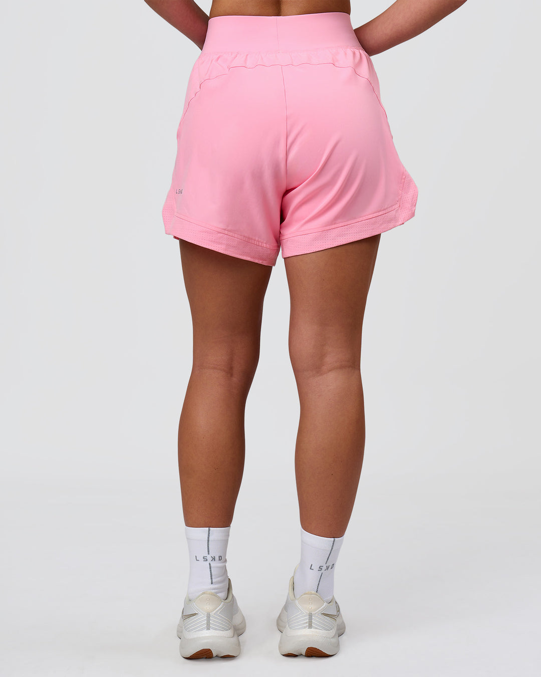Woman wearing Challenger 5" Lined Performance Short - Pink Rose | Model:Issy | Size:XS - view 4