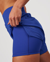 Woman wearing Challenger 5" Lined Performance Short - Power Cobalt | Model:Issy | Size:XS | Thumbnail Index: 8