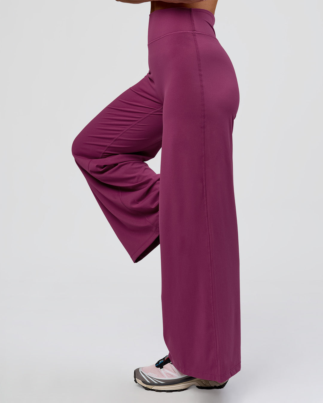 Woman wearing Elixir High-Rise Petite Pant - Boysenberry | Model:Issy | Size:XS - view 6