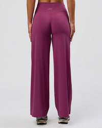 Woman wearing Elixir High-Rise Petite Pant - Boysenberry | Model:Issy | Size:XS | Thumbnail Index: 4