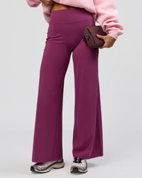 Woman wearing Elixir High-Rise Petite Pant - Boysenberry | Model:Issy | Size:XS | Thumbnail Index: 7