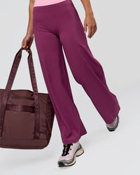 Woman wearing Elixir High-Rise Petite Pant - Boysenberry | Model:Issy | Size:XS | Thumbnail Index: 8