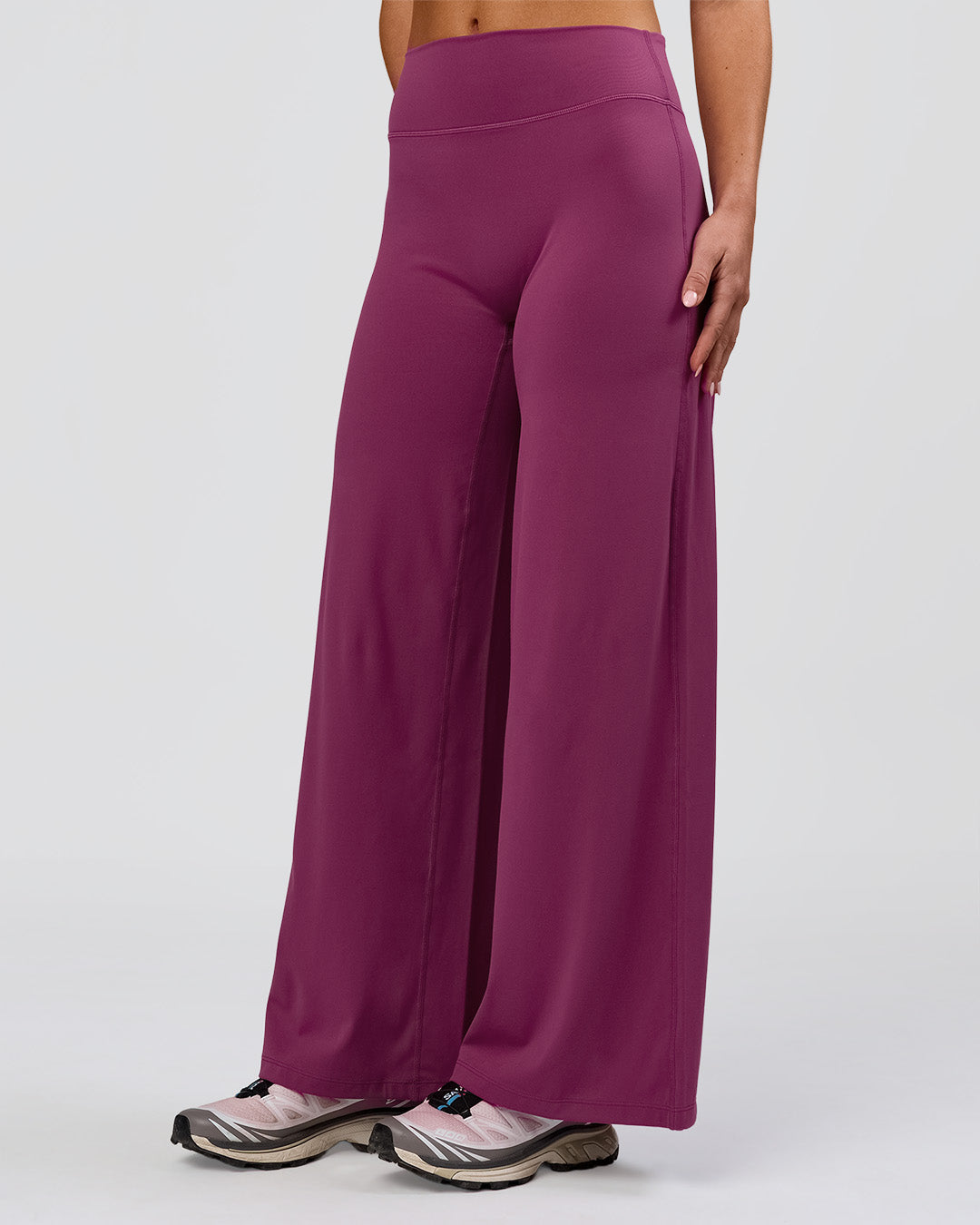 Woman wearing Elixir High-Rise Petite Pant - Boysenberry | Model:Issy | Size:XS - view 12
