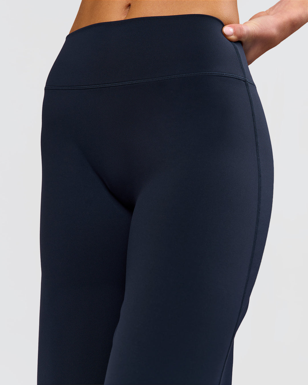 Woman wearing Elixir High-Rise Petite Pant - Midnight Navy | Model:Issy | Size:XS - view 6