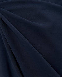Woman wearing Elixir High-Rise Petite Pant - Midnight Navy | Model:Issy | Size:XS | Thumbnail Index: 10