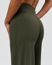 Woman wearing Elixir High-Rise Petite Pant - Pure Olive | Model:Issy | Size:XS | Thumbnail Index: 7