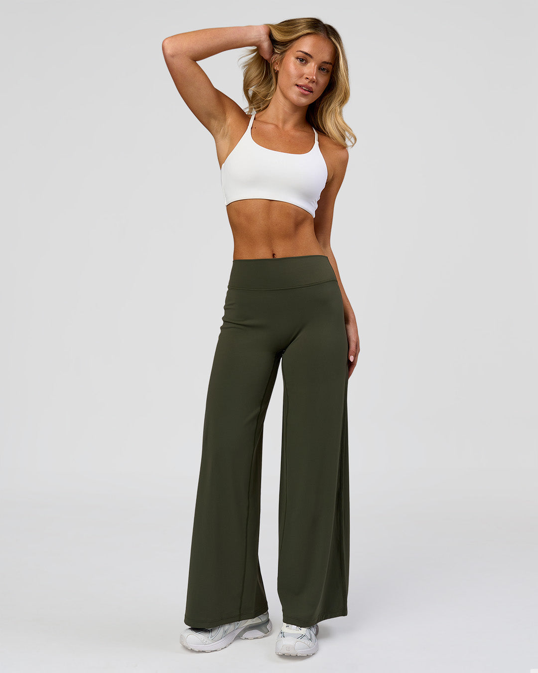 Woman wearing Elixir High-Rise Petite Pant - Pure Olive | Model:Issy | Size:XS - view 6