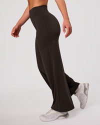 Woman wearing Elixir High-Rise Petite Pant - Ground Coffee | Model:Issy | Size:XS | Thumbnail Index: 2