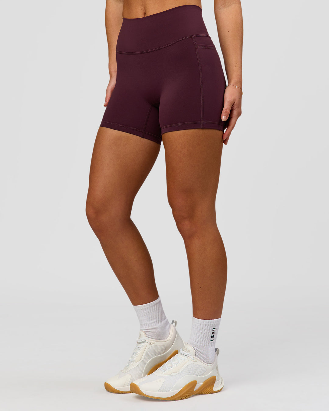 Woman wearing Fusion High-Rise 4" Short Pockets - Cherry Lacquer | Model:Issy | Size:XS - view 7