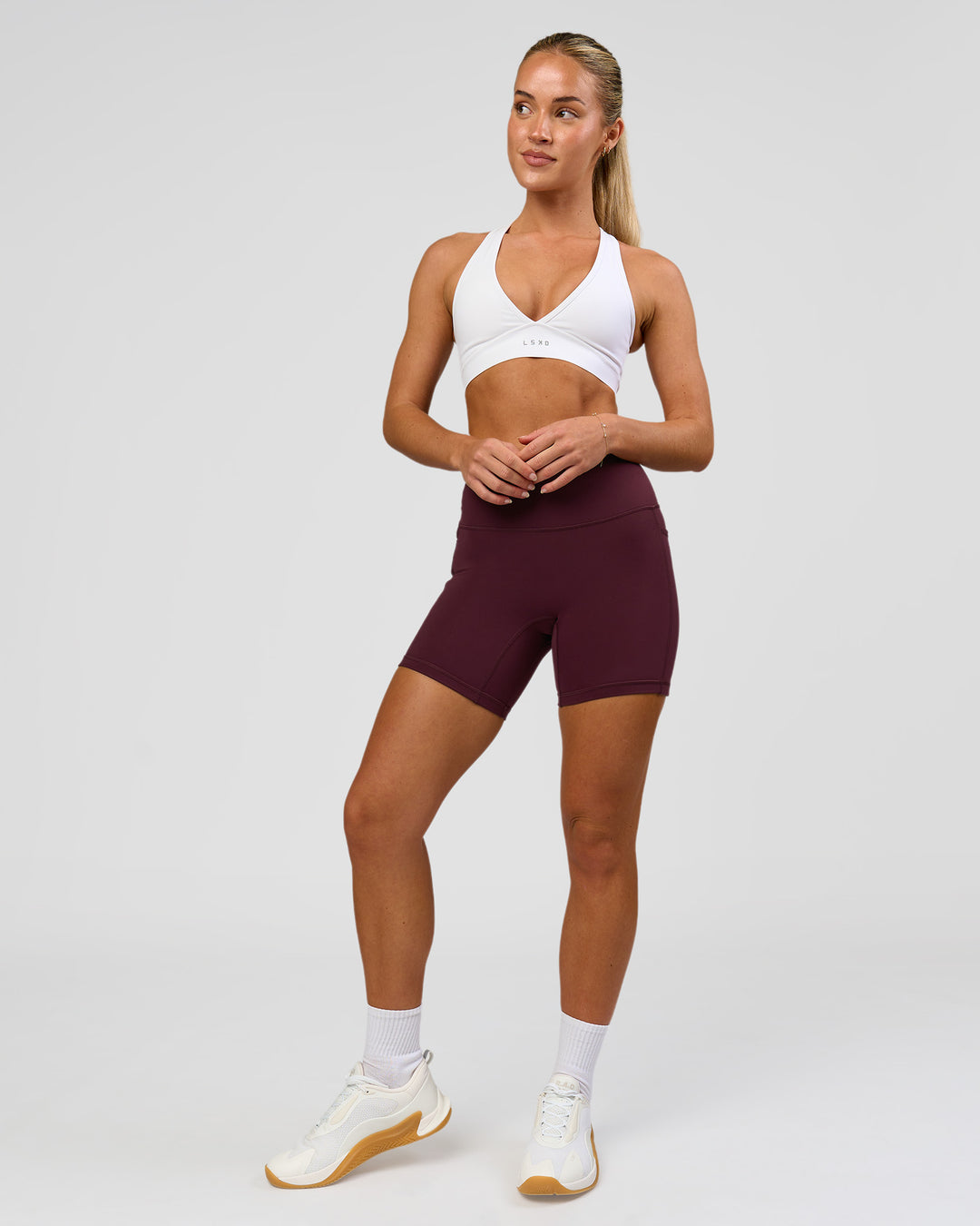 Woman wearing Fusion High-Rise 6" Short Pockets - Cherry Lacquer | Model:Issy | Size:XS - view 7