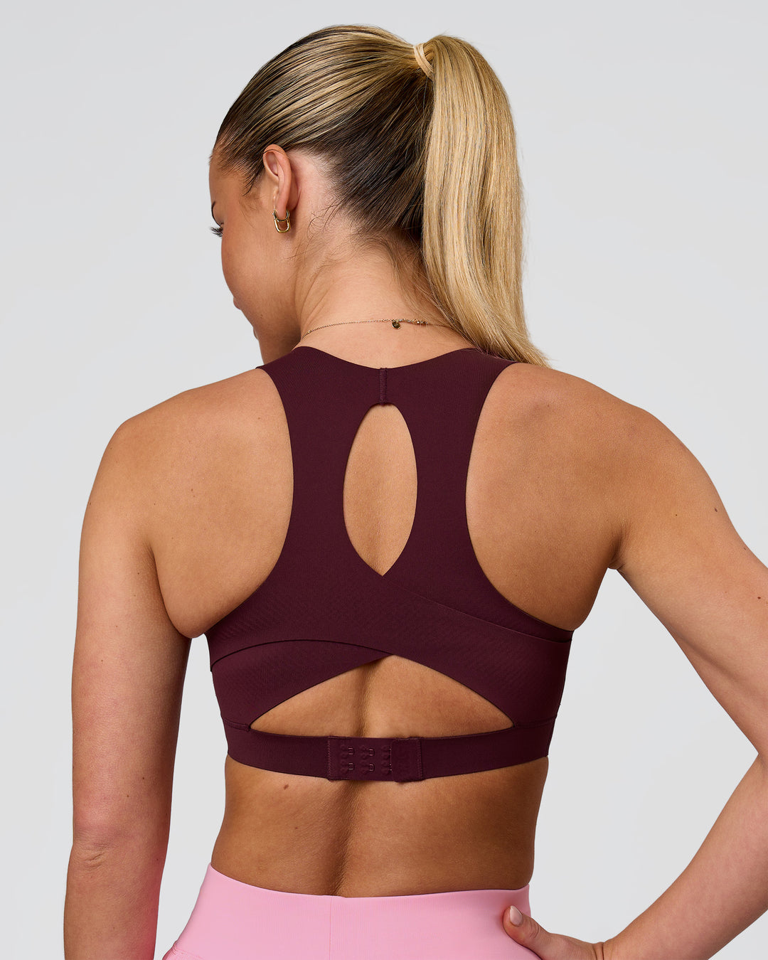 Woman wearing Fusion Sports Bra 2.0 - Cherry Lacquer | Model:Issy | Size:XS - view 8