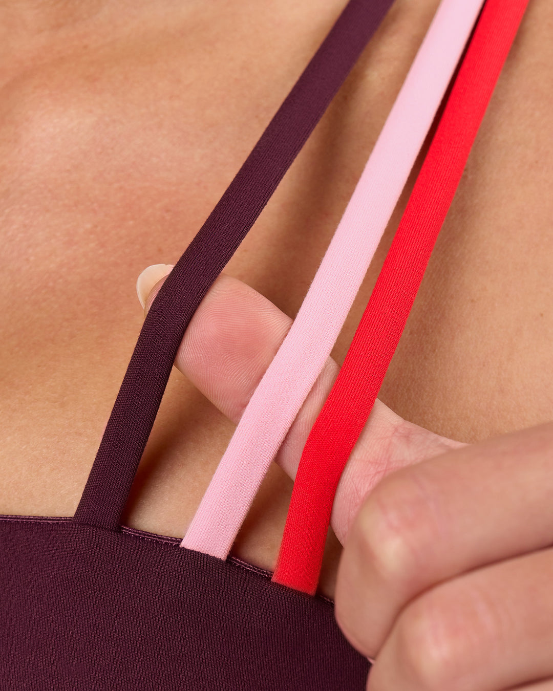 Woman wearing Galvanise Sports Bra 2.0 - Cherry Lacquer-Multi | Model:Issy | Size:XS - view 7