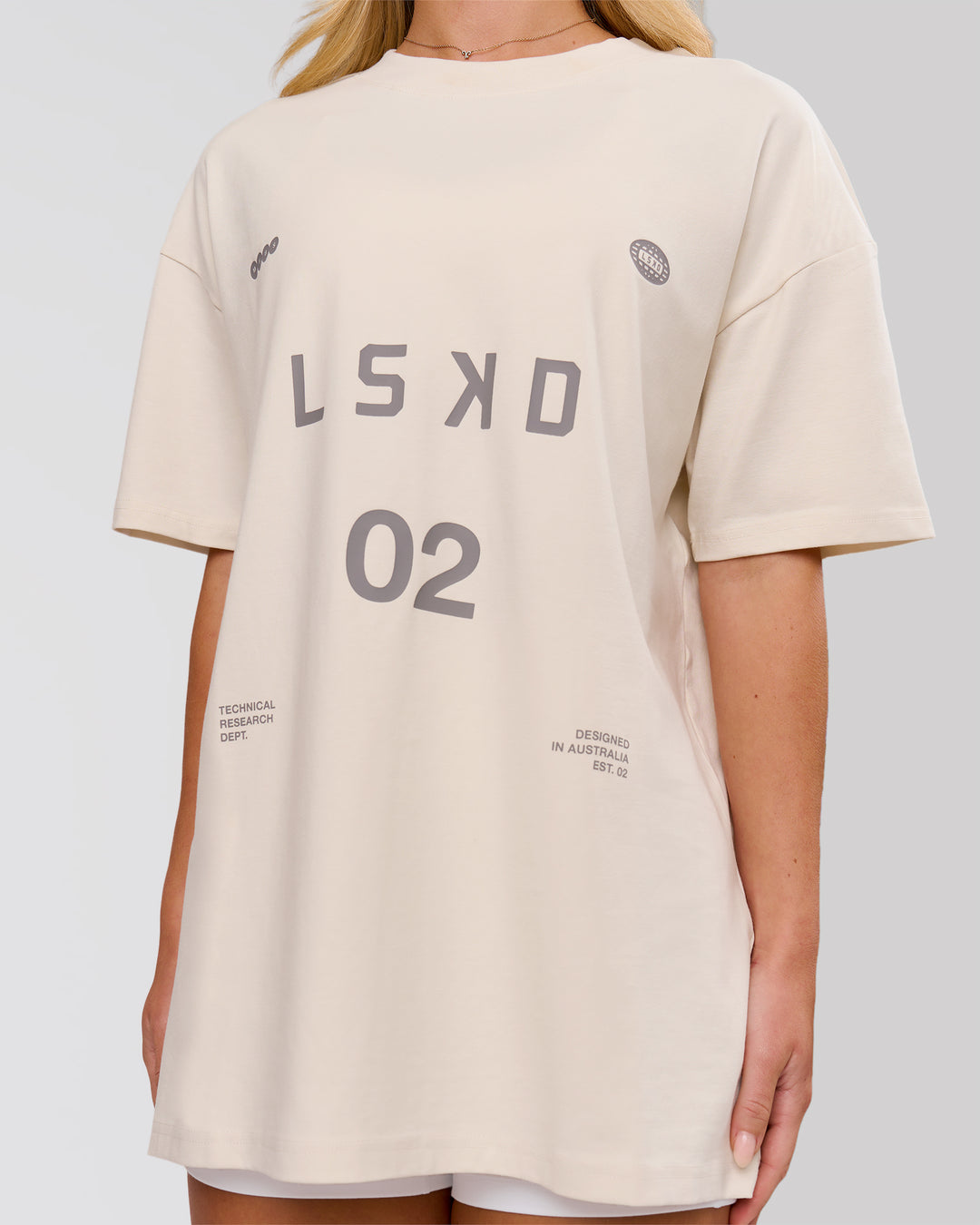 Woman wearing Game Plan Heavyweight FLXCotton Oversized Tee - Vanilla Bean | Model:Issy | Size:XS - view 7