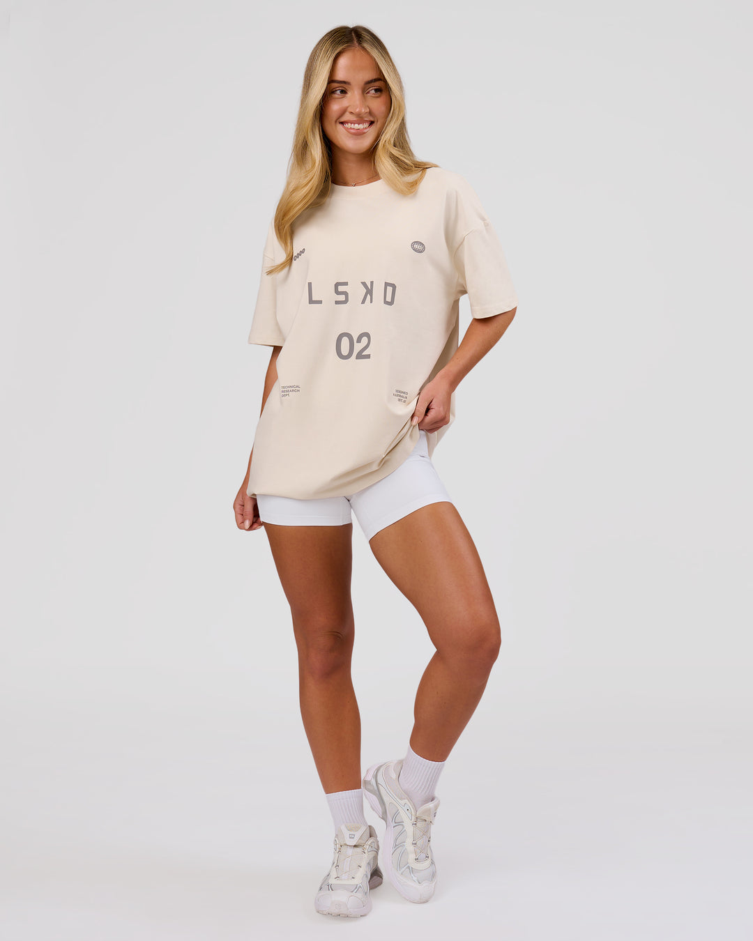 Woman wearing Game Plan Heavyweight FLXCotton Oversized Tee - Vanilla Bean | Model:Issy | Size:XS - view 9