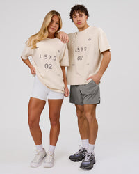 Woman wearing Game Plan Heavyweight FLXCotton Oversized Tee - Vanilla Bean | Model:Issy | Size:XS | Thumbnail Index: 10