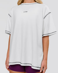 Woman wearing Go-To Contrast Oversized Heavyweight FLXCotton Tee - White-Black | Model:Issy | Size:XS | Thumbnail Index: 4