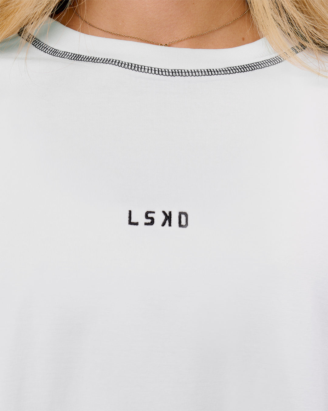 Woman wearing Go-To Contrast Oversized Heavyweight FLXCotton Tee - White-Black | Model:Issy | Size:XS - view 3