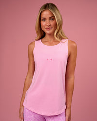 Woman wearing Go-To FLXCotton Longline Tank - Pink Rose-Ultra Pink | Model:Issy | Size:XS | Thumbnail Index: 0