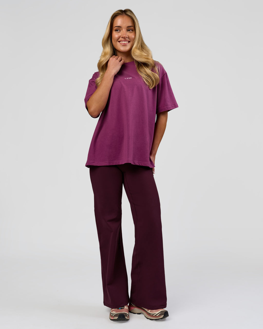 Woman wearing Go-To FLXCotton Oversized Tee - Boysenberry-White | Model:Issy | Size:XS - view 3