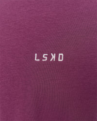 Woman wearing Go-To FLXCotton Oversized Tee - Boysenberry-White | Model:Issy | Size:XS | Thumbnail Index: 3