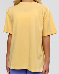 Woman wearing Go-To FLXCotton Oversized Tee - Lemon-White | Model:Issy | Size:XS | Thumbnail Index: 2