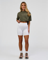 Woman wearing Go-To FLXCotton Oversized Tee - Pure Olive Washed | Model:Issy | Size:XS | Thumbnail Index: 6