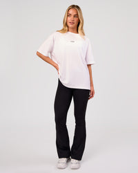 Woman wearing Go-To FLXCotton Oversized Tee - White-Black | Model:Issy | Size:XS | Thumbnail Index: 5