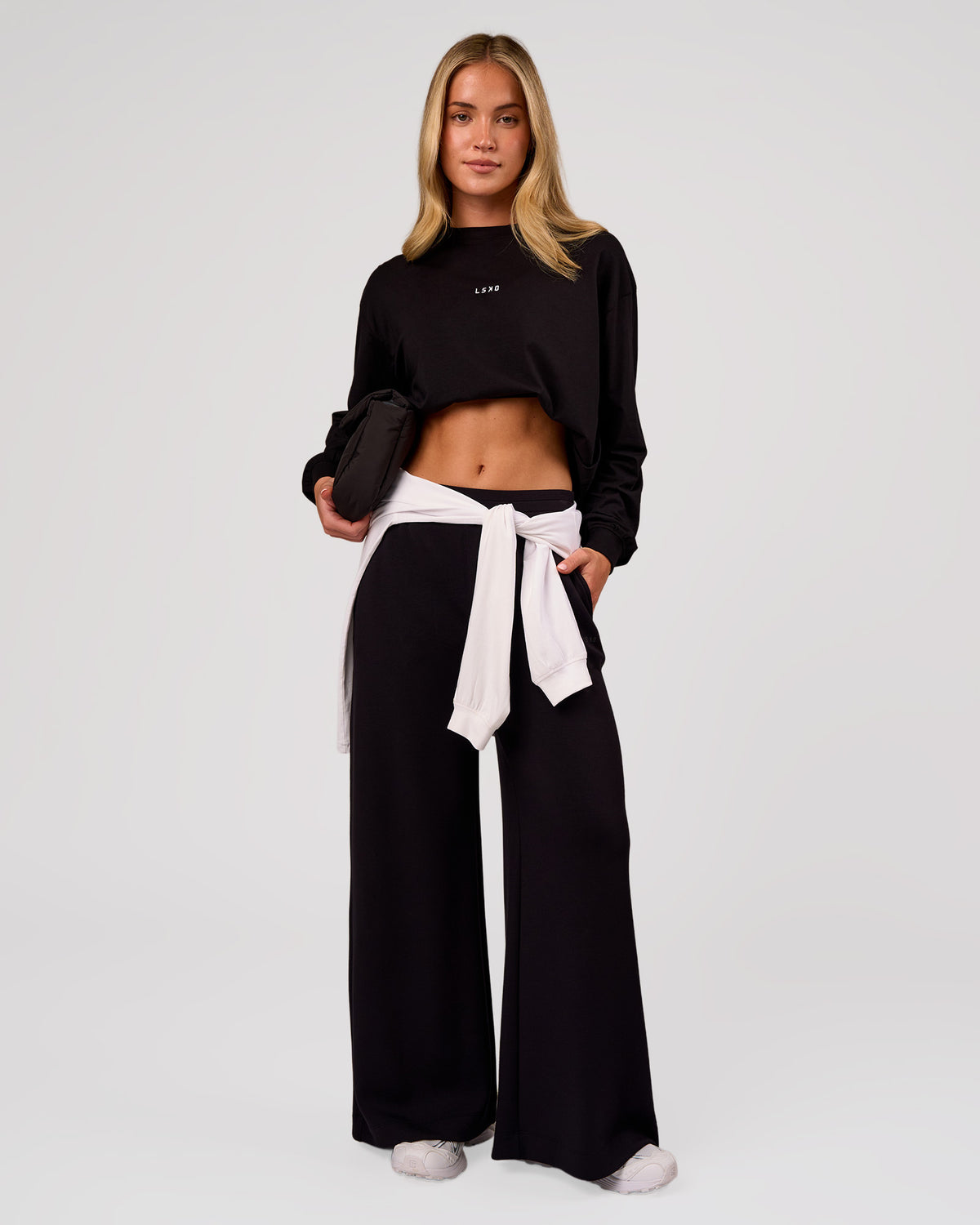 Woman wearing Go-To Long Sleeve FLXCotton Oversized Tee - Black-White | Model:Issy | Size:XS - view 2