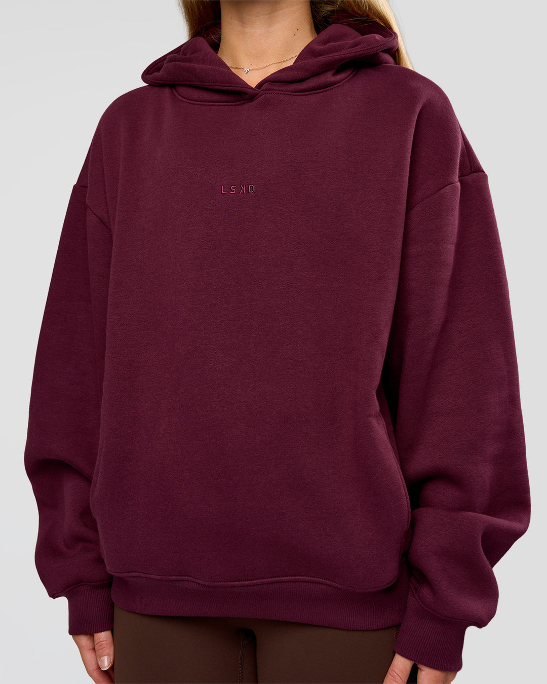 Woman wearing Go-To Oversized Hoodie - Cherry Lacquer | Model:Issy | Size:XS - view 6